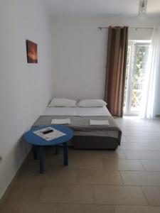 Postel nebo postele na pokoji v ubytování Apartments Alexa