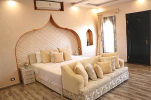 Postel nebo postele na pokoji v ubytování Casa D'or Dahab + 37 fotografií