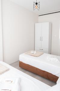 A bed or beds in a room at Araz Suit