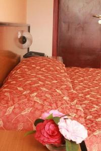 Ein Bett oder Betten in einem Zimmer der Unterkunft Aries