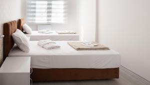 A bed or beds in a room at Araz Suit
