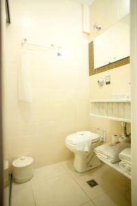 Ванна кімната в Royal Plaza Hotel