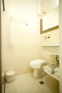 Koupelna v ubytování Royal Plaza Hotel