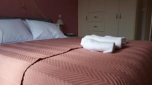 A bed or beds in a room at Nicol's Casetta