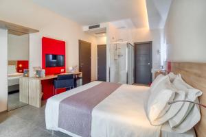 Krevet ili kreveti u jedinici u objektu Boutique Hotel Bramante & SPA