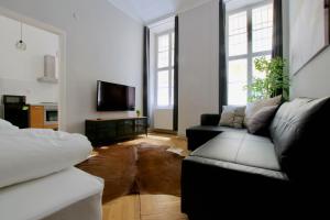 Televízia a/alebo spoločenská miestnosť v ubytovaní Standard Apartment by Hi5 - Steindl street
