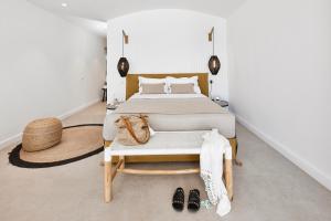 Łóżko lub łóżka w pokoju w obiekcie Altera Pars Suites