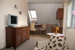 Kuchyň nebo kuchyňský kout v ubytování Apartamenty Fala