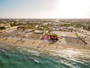 an aerial view of a beach with a group of people at TUI MAGIC LIFE Penelope Beach - Families & Couples in Midoun