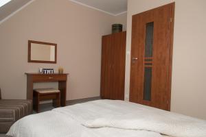 Postel nebo postele na pokoji v ubytování Apartamenty Fala