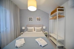 
a bedroom with a bed and a desk at My Charm Lisbon Suites in Lisbon
