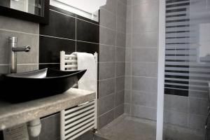 Bagno di Logis Hôtel L'Ayguelade