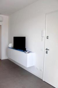TV a/nebo společenská místnost v ubytování West beach 3