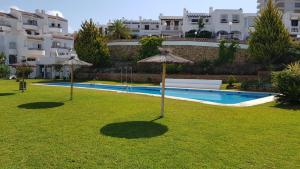 Bazén v ubytovaní Townhouse Mar y Sol alebo v jeho blízkosti