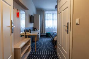 Posteľ alebo postele v izbe v ubytovaní Medical Wellness & SPA Werona