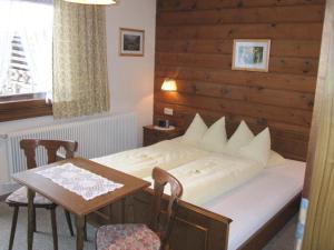 Postel nebo postele na pokoji v ubytování Haus Walch