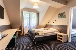 Posteľ alebo postele v izbe v ubytovaní Medical Wellness & SPA Werona