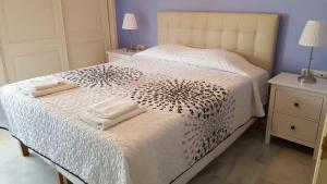 Posteľ alebo postele v izbe v ubytovaní Townhouse Mar y Sol