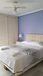 Posteľ alebo postele v izbe v ubytovaní Townhouse Mar y Sol