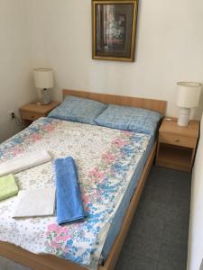 Posteľ alebo postele v izbe v ubytovaní Apartments Medusa