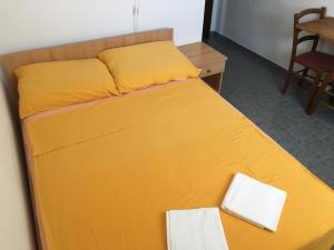 Posteľ alebo postele v izbe v ubytovaní Apartments Medusa
