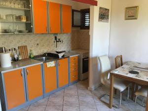 Kuchyňa alebo kuchynka v ubytovaní Apartments Medusa
