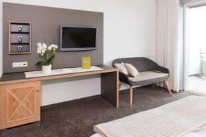 TV a/nebo společenská místnost v ubytování Hotel Freisicht
