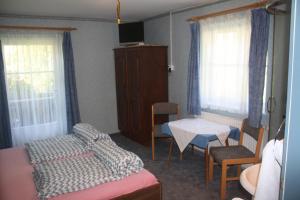 Postel nebo postele na pokoji v ubytování Casa da Honna