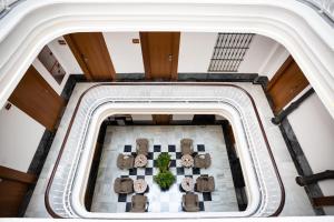 an overhead view of the lobby of a building at Plazuela del Carbón Suites in Cádiz