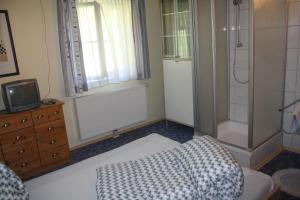 Postel nebo postele na pokoji v ubytování Casa da Honna