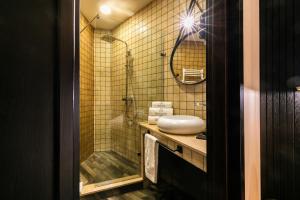 Koupelna v ubytování Hotel Adamo