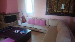A seating area at Holiday Home in Chalkidiki, Lakkoma
