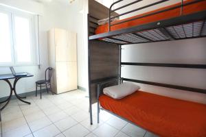 Postel nebo postele na pokoji v ubytování Jammin' Hostel & Bar Rimini