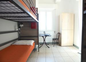 Postel nebo postele na pokoji v ubytování Jammin' Hostel & Bar Rimini