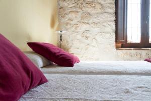 Postel nebo postele na pokoji v ubytování Casa Rural Los Yeros Aldeasoña - Segovia