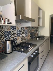 A cozinha ou kitchenette de Scala Family Home