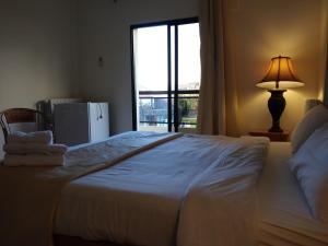 Een bed of bedden in een kamer bij Master's Hotel - Ehden