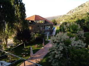 an aerial view of a house with a garden at Master's Hotel - Ehden in Ehden