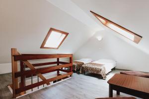 Posteľ alebo postele v izbe v ubytovaní Apartamenty Gromada Międzyzdroje