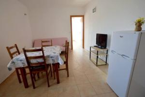 Kuchyň nebo kuchyňský kout v ubytování Apartmani Luka