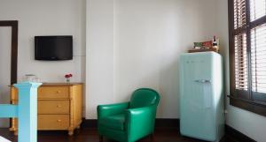 TV a/nebo společenská místnost v ubytování Hotel Havana