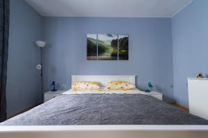 Katil atau katil-katil dalam bilik di Apartments Mira