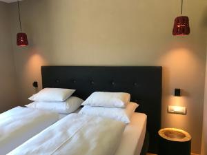 Ένα ή περισσότερα κρεβάτια σε δωμάτιο στο Klein Fein Hotel zum Graf