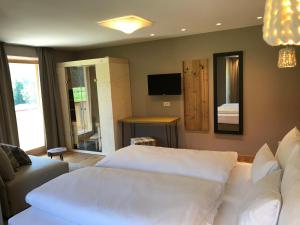 Ένα ή περισσότερα κρεβάτια σε δωμάτιο στο Klein Fein Hotel zum Graf