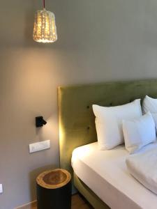 Ένα ή περισσότερα κρεβάτια σε δωμάτιο στο Klein Fein Hotel zum Graf