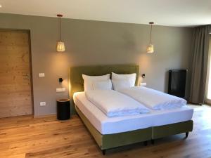 Ένα ή περισσότερα κρεβάτια σε δωμάτιο στο Klein Fein Hotel zum Graf