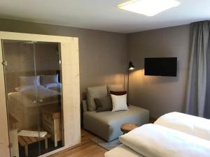 Ένα ή περισσότερα κρεβάτια σε δωμάτιο στο Klein Fein Hotel zum Graf