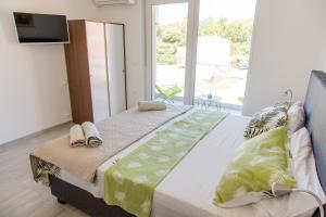 Posteľ alebo postele v izbe v ubytovaní VILLA HORIZONT + 37 fotografií