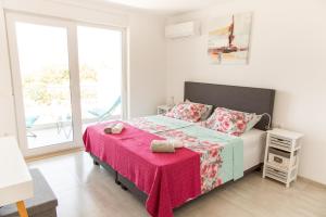 Posteľ alebo postele v izbe v ubytovaní VILLA HORIZONT
