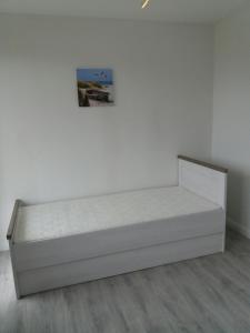 Postel nebo postele na pokoji v ubytování Apartament Thomas